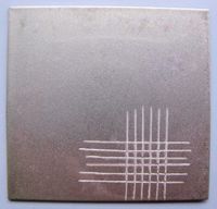 A cross cut of modified UV-curable clear varnish on steel is shown.