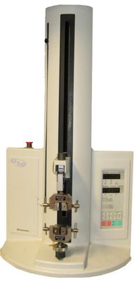 Picture shows the universal testing machine Shimadzu EZ Test with screw grips.