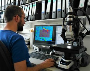 The 3D microscope is shown in action.