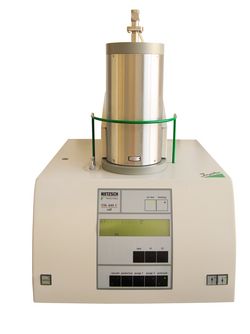 The STA 449 C from Netzsch is shown. This instrument works simultaneously as a DSC/DTA and as a thermobalance (TGA). Analysis can be carried out ranged from RT up to 1500 °C.