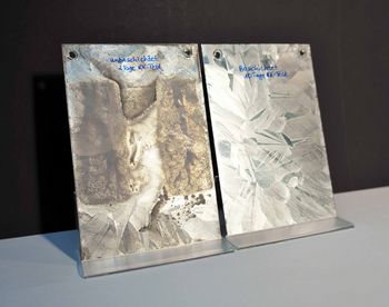 Shown here are two hot-dip galvanized steel sheets that have passed a 10-day condensation water constant climate test. The left picture shows the sample without and right with gloss protection.